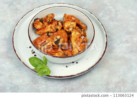 Homemade baked or fried chicken wings. 113063124