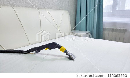 Mattress dry cleaning using a professional machine and chemicals. Dry cleaning at home. 113063210