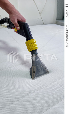 cleaning company cleans the mattress. General cleaning of the mattress. 113063211