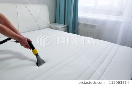 Spring cleaning or regular cleaning of the mattress. 113063214