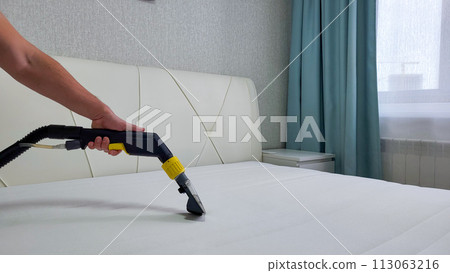 Spring cleaning or regular cleaning of the mattress. 113063216