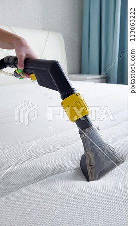 Spring cleaning or regular cleaning of the mattress. 113063222