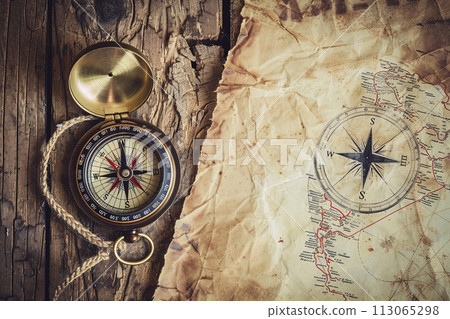 Compass and Map on Paper 113065298