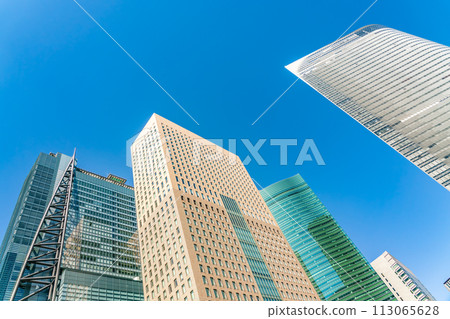 Landscape of the office town looking up at a skyscraper Landscape of the office town looking up at a skyscraper 113065628