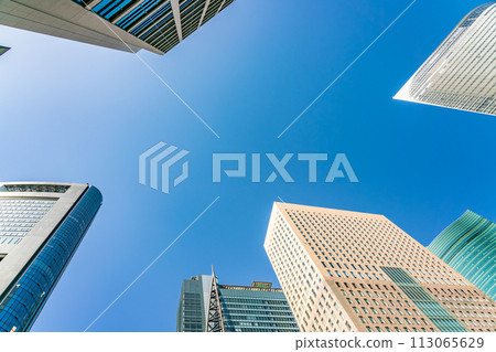 Landscape of the office town looking up at a skyscraper Landscape of the office town looking up at a skyscraper 113065629