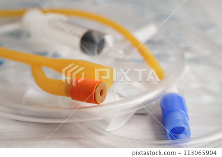Foley catheter and urine drainage bag collect urine for disability or patient in hospital. Foley catheter and urine drainage bag collect urine for disability or patient in hospital. 113065904