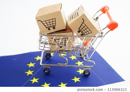 Online shopping, Shopping cart box on EU European Union flag, import export, finance commerce. Online shopping, Shopping cart box on EU European Union flag, import export, finance commerce. 113066321