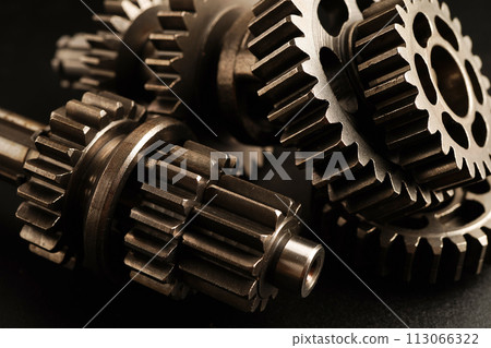 Metal gear wheel engine car and bike, mechanic industry concept. Metal gear wheel engine car and bike, mechanic industry concept. 113066322