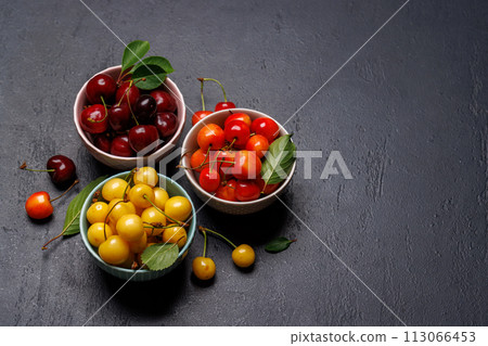 A vibrant and colorful cherry, bursting with sweet juiciness A vibrant and colorful cherry, bursting with sweet juiciness 113066453