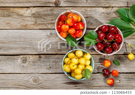 A vibrant and colorful cherry, bursting with sweet juiciness A vibrant and colorful cherry, bursting with sweet juiciness 113066455