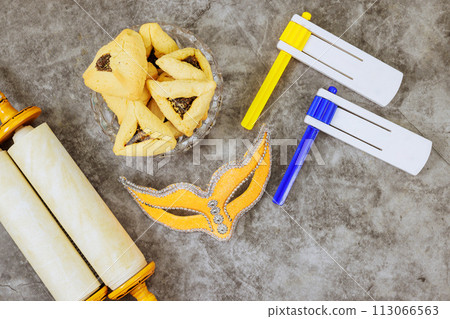 Jewish holiday happy purim celebration with carnival decoration a shofar tallit carnival masks 113066563