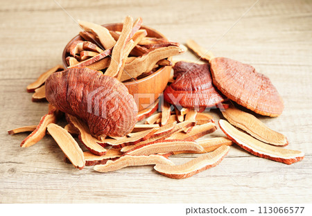 Lingzhi or Reishi mushroom with capsules, organic natural healthy food. 113066577