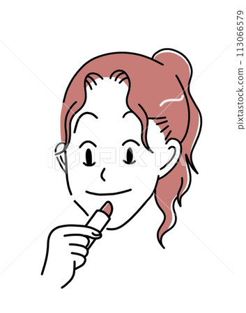 A woman applying a lip 113066579
