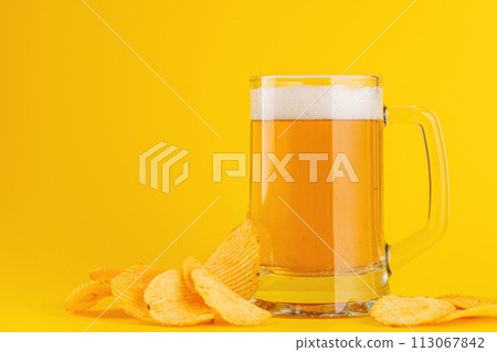 Beer and potato chips 113067842