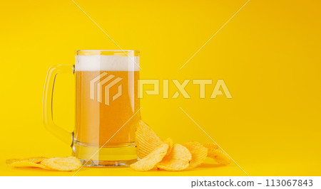Beer and potato chips 113067843