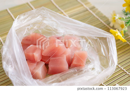 Diced tuna in a plastic bag Diced tuna in a plastic bag 113067923
