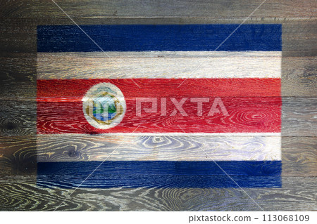 Costa Rica flag on rustic old wood surface background Costa Rica flag on rustic old wood surface background 113068109