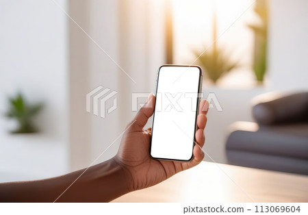 African American Hand Holding Smartphone with Blank Screen. Augmented Reality Smartphone 113069604