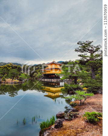 Yellow Pagoda Reflections In The Lake Water  113070959
