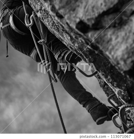 Man in body harnesses feature life-safety, viaferrata in mountains of pyrenees 113071067