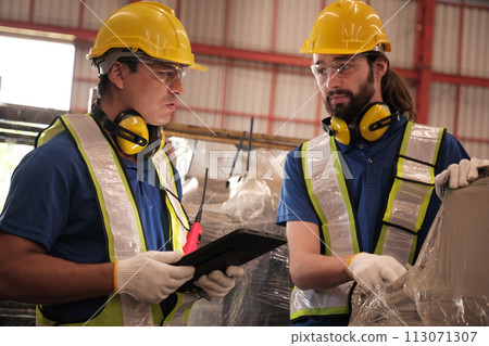 Team of engineers working at the factory Team of engineers working at the factory 113071307