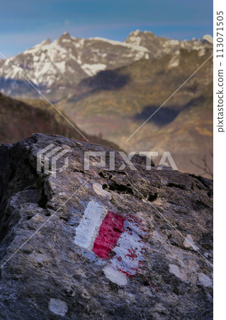 Marking of a long-distance hiking route, white and red, Itineraries in France, Marking on rock 113071505