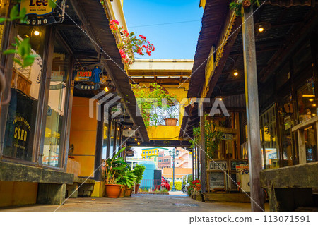 American Village blue sky cityscape tropical country street travel tourism Okinawa 113071591
