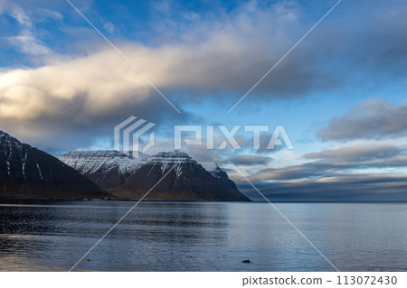 Beginning of sunset at the fjord, Westfjords, Iceland 113072430