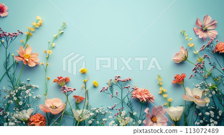 flowers on blue background with copy space. Abstract natural floral frame layout. Wedding invitation. International Women day, Mother Day concept 113072489