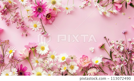 flowers on pink background with copy space. Abstract natural floral frame layout. Wedding invitation. International Women day, Mother Day concept flowers on pink background with copy space. Abstract natural floral frame layout. Wedding invitation. International Women day, Mother Day concept 113072490