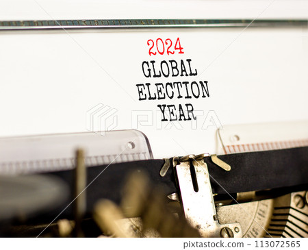 2024 global election year symbol. Concept words 2024 global election year typed on beautiful old retro typewriter. Beautiful white background. Business 2024 global election year concept. Copy space 2024 global election year symbol. Concept words 2024 global election year typed on beautiful old retro typewriter. Beautiful white background. Business 2024 global election year concept. Copy space 113072565