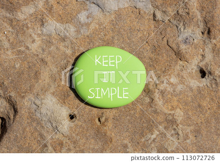 Keep it simple symbol. Concept word Keep it simple on beautiful big green stone. Beautiful brown stone background. Business motivational keep it simple concept. Copy space. Keep it simple symbol. Concept word Keep it simple on beautiful big green stone. Beautiful brown stone background. Business motivational keep it simple concept. Copy space. 113072726