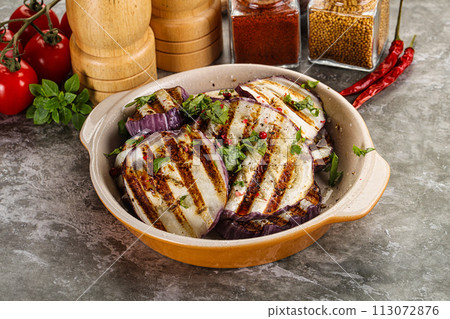 Grilled eggplant slices with cilantro 113072876