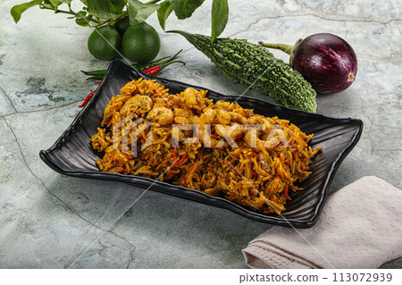 Indian cuisine - briani with prawns Indian cuisine - briani with prawns 113072939