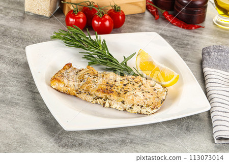 Baked salmon fish served rosemary 113073014