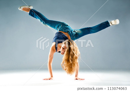 young and beautiful dancer posing in studio young and beautiful dancer posing in studio 113074063