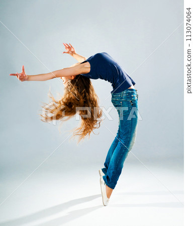 young and beautiful dancer posing in studio 113074064
