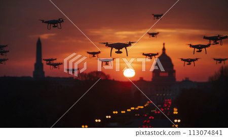 Swarm of UAV Unmanned Aircraft Drones Flying Near The United States Capitol At Sunset. 113074841