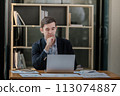 Handsome well dressed businessman working at his office, businessman working on a project 113074887