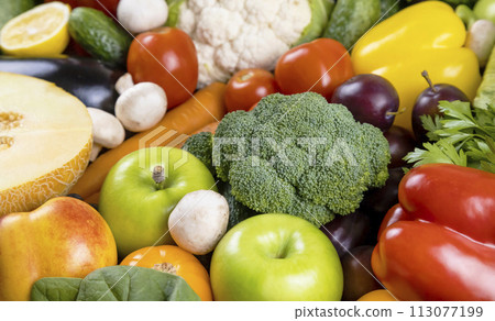A set of fruits and vegetables, close up. The concept of healthy and wholesome food. 113077199