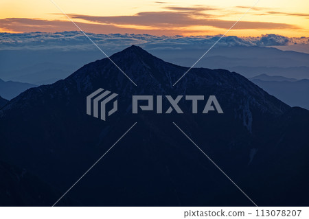 Mt. Jonen at dawn seen from the ridgeline of Mt. Hotakadake in the Northern Alps 113078207