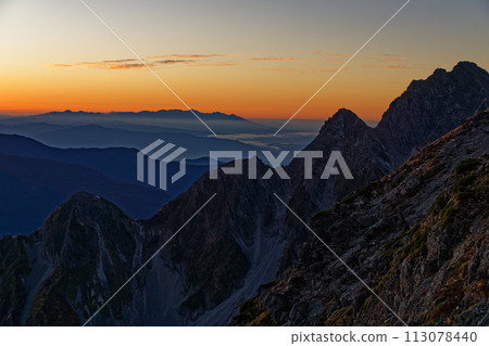 Hotakadake and Yatsugatake at dawn seen from near the Hotakadake mountain lodge in the Northern Alps 113078440