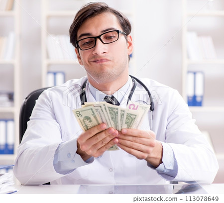 Doctor in corruption concept with being offered bribe Doctor in corruption concept with being offered bribe 113078649