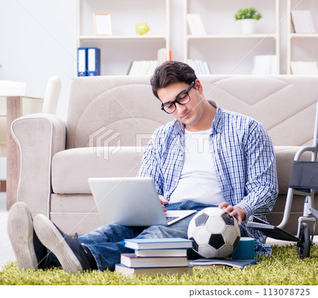 Young student studying at home 113078725
