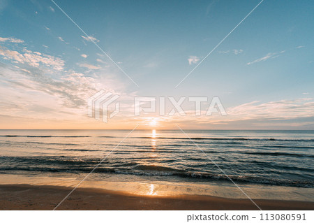 beautiful beach sunset 113080591