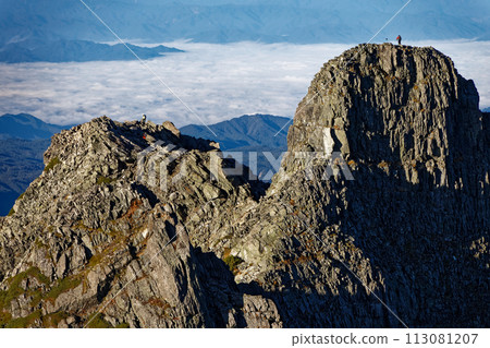 Gendarme and climbers seen from Mt. Okuhotaka in the Northern Alps Gendarme and climbers seen from Mt. Okuhotaka in the Northern Alps 113081207