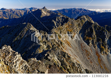Yarigatake and the Northern Alps mountain range seen from Mt. Okuhotaka in the morning 113081216