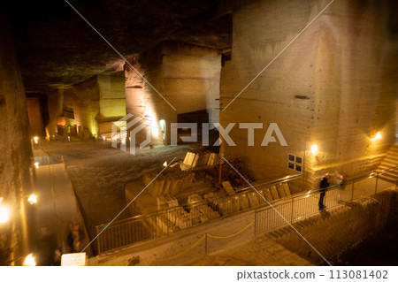 A mysterious illuminated space in the ruins of an underground mine A mysterious illuminated space in the ruins of an underground mine 113081402