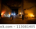A mysterious illuminated space in the ruins of an underground mine 113081405
