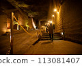 A mysterious illuminated space in the ruins of an underground mine 113081407